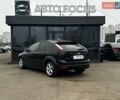 Черный Форд Фокус, объемом двигателя 1.56 л и пробегом 178 тыс. км за 6790 $, фото 5 на Automoto.ua