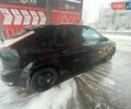 Черный Форд Фокус, объемом двигателя 1.8 л и пробегом 242 тыс. км за 5000 $, фото 2 на Automoto.ua