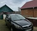 Чорний Форд Фокус, об'ємом двигуна 2 л та пробігом 235 тис. км за 5500 $, фото 1 на Automoto.ua