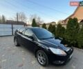 Черный Форд Фокус, объемом двигателя 1.6 л и пробегом 59 тыс. км за 8100 $, фото 1 на Automoto.ua