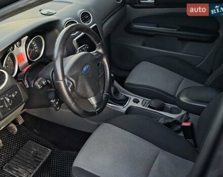 Черный Форд Фокус, объемом двигателя 1.6 л и пробегом 189 тыс. км за 5599 $, фото 20 на Automoto.ua