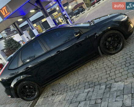 Черный Форд Фокус, объемом двигателя 1.8 л и пробегом 240 тыс. км за 5100 $, фото 6 на Automoto.ua