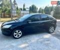 Черный Форд Фокус, объемом двигателя 1.39 л и пробегом 135 тыс. км за 5500 $, фото 1 на Automoto.ua