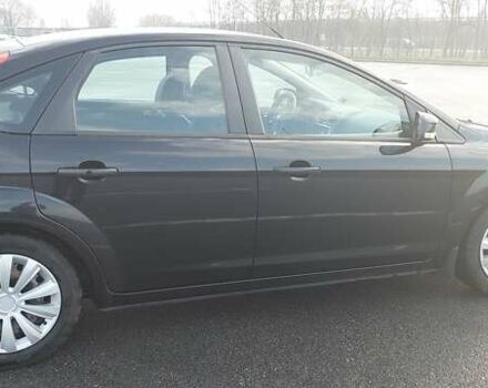Черный Форд Фокус, объемом двигателя 1.6 л и пробегом 211 тыс. км за 5600 $, фото 2 на Automoto.ua