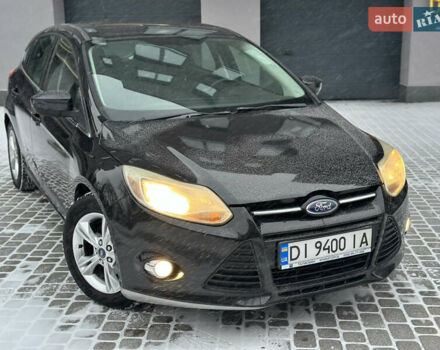 Чорний Форд Фокус, об'ємом двигуна 2 л та пробігом 164 тис. км за 6299 $, фото 4 на Automoto.ua