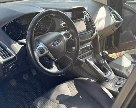 Черный Форд Фокус, объемом двигателя 1.6 л и пробегом 196 тыс. км за 8300 $, фото 6 на Automoto.ua