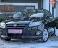 Черный Форд Фокус, объемом двигателя 1.6 л и пробегом 250 тыс. км за 8250 $, фото 2 на Automoto.ua