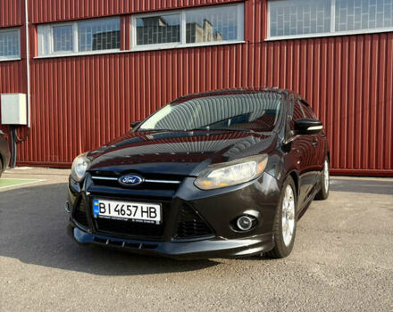 Чорний Форд Фокус, об'ємом двигуна 2 л та пробігом 172 тис. км за 8800 $, фото 1 на Automoto.ua
