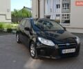 Черный Форд Фокус, объемом двигателя 1 л и пробегом 165 тыс. км за 5400 $, фото 1 на Automoto.ua