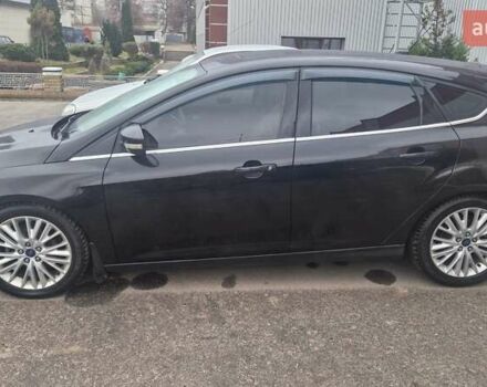 Чорний Форд Фокус, об'ємом двигуна 2 л та пробігом 127 тис. км за 10800 $, фото 1 на Automoto.ua