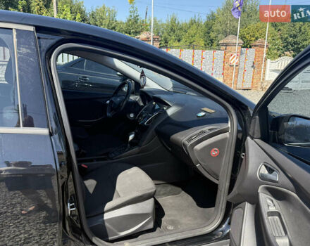 Чорний Форд Фокус, об'ємом двигуна 1 л та пробігом 70 тис. км за 8800 $, фото 6 на Automoto.ua