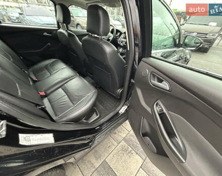 Чорний Форд Фокус, об'ємом двигуна 2 л та пробігом 88 тис. км за 11000 $, фото 22 на Automoto.ua