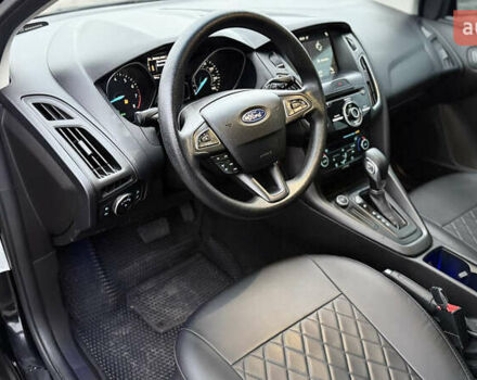 Черный Форд Фокус, объемом двигателя 2 л и пробегом 139 тыс. км за 8700 $, фото 8 на Automoto.ua