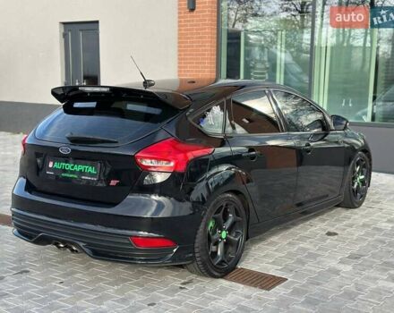 Чорний Форд Фокус, об'ємом двигуна 2 л та пробігом 123 тис. км за 12990 $, фото 13 на Automoto.ua