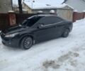 Чорний Форд Фокус, об'ємом двигуна 2 л та пробігом 255 тис. км за 6700 $, фото 1 на Automoto.ua