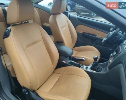 Черный Форд Фокус, объемом двигателя 2 л и пробегом 122 тыс. км за 6999 $, фото 18 на Automoto.ua