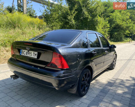 Черный Форд Фокус, объемом двигателя 2 л и пробегом 151 тыс. км за 3850 $, фото 5 на Automoto.ua