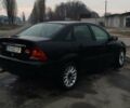 Черный Форд Фокус, объемом двигателя 1.8 л и пробегом 260 тыс. км за 1800 $, фото 3 на Automoto.ua