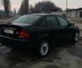 Черный Форд Фокус, объемом двигателя 1.8 л и пробегом 260 тыс. км за 1800 $, фото 3 на Automoto.ua