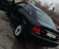 Черный Форд Фокус, объемом двигателя 1.8 л и пробегом 260 тыс. км за 1800 $, фото 1 на Automoto.ua