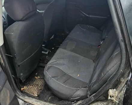 Черный Форд Фокус, объемом двигателя 1.6 л и пробегом 300 тыс. км за 1800 $, фото 10 на Automoto.ua