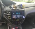 Черный Форд Фокус, объемом двигателя 1.8 л и пробегом 190 тыс. км за 4100 $, фото 1 на Automoto.ua