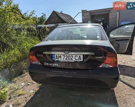 Черный Форд Фокус, объемом двигателя 1.8 л и пробегом 315 тыс. км за 3100 $, фото 5 на Automoto.ua