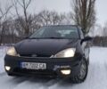 Черный Форд Фокус, объемом двигателя 1.8 л и пробегом 315 тыс. км за 3100 $, фото 1 на Automoto.ua