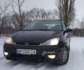 Черный Форд Фокус, объемом двигателя 1.8 л и пробегом 315 тыс. км за 3100 $, фото 1 на Automoto.ua