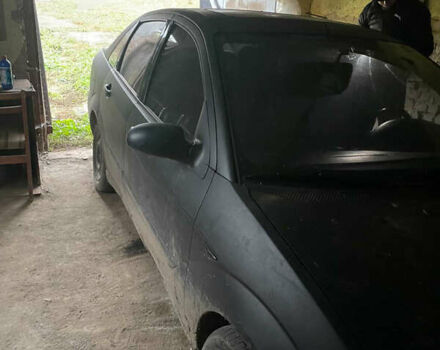 Черный Форд Фокус, объемом двигателя 1.8 л и пробегом 300 тыс. км за 600 $, фото 3 на Automoto.ua