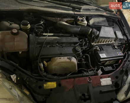 Черный Форд Фокус, объемом двигателя 1.8 л и пробегом 300 тыс. км за 600 $, фото 12 на Automoto.ua