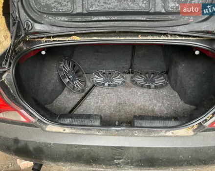 Черный Форд Фокус, объемом двигателя 1.8 л и пробегом 300 тыс. км за 600 $, фото 22 на Automoto.ua