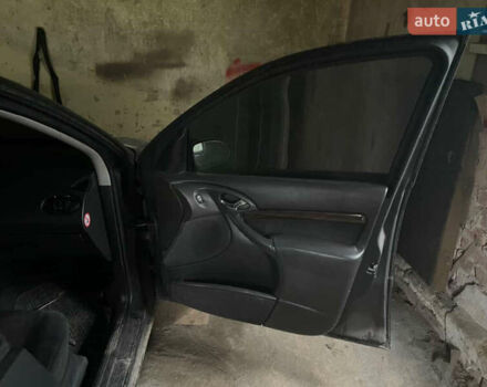 Черный Форд Фокус, объемом двигателя 1.8 л и пробегом 300 тыс. км за 600 $, фото 5 на Automoto.ua