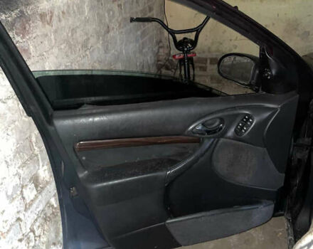 Черный Форд Фокус, объемом двигателя 1.8 л и пробегом 300 тыс. км за 600 $, фото 6 на Automoto.ua