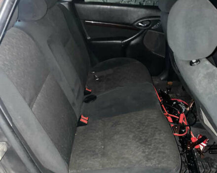 Черный Форд Фокус, объемом двигателя 1.8 л и пробегом 300 тыс. км за 600 $, фото 9 на Automoto.ua