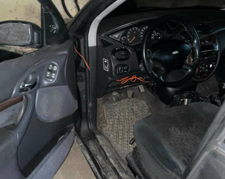 Черный Форд Фокус, объемом двигателя 1.8 л и пробегом 300 тыс. км за 600 $, фото 18 на Automoto.ua