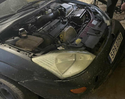 Черный Форд Фокус, объемом двигателя 1.8 л и пробегом 300 тыс. км за 600 $, фото 19 на Automoto.ua