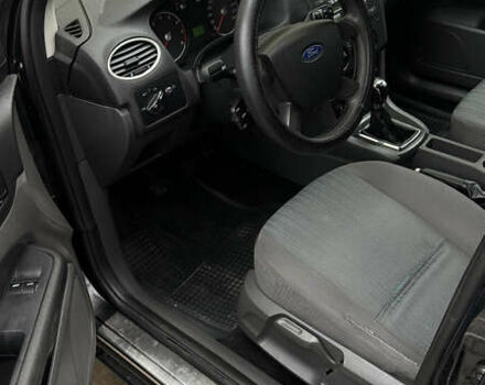 Черный Форд Фокус, объемом двигателя 1.39 л и пробегом 201 тыс. км за 4899 $, фото 12 на Automoto.ua