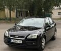 Черный Форд Фокус, объемом двигателя 1.6 л и пробегом 263 тыс. км за 4515 $, фото 1 на Automoto.ua