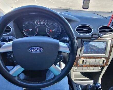 Черный Форд Фокус, объемом двигателя 1.8 л и пробегом 186 тыс. км за 4900 $, фото 18 на Automoto.ua