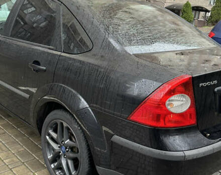 Черный Форд Фокус, объемом двигателя 1.39 л и пробегом 201 тыс. км за 4899 $, фото 5 на Automoto.ua