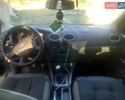 Черный Форд Фокус, объемом двигателя 1.39 л и пробегом 270 тыс. км за 3450 $, фото 7 на Automoto.ua