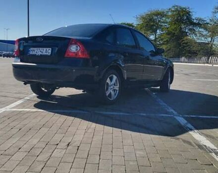 Черный Форд Фокус, объемом двигателя 1.8 л и пробегом 186 тыс. км за 4900 $, фото 15 на Automoto.ua