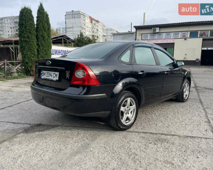 Форд Фокус 2006 в Сумах на Automoto.ua Черный Форд Фокус, объемом двигателя 2 л и пробегом 218 тыс. км за 5500 $, фото 6 на Automoto.ua