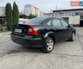 Форд Фокус 2006 в Сумах на Automoto.ua Черный Форд Фокус, объемом двигателя 2 л и пробегом 218 тыс. км за 5500 $, фото 6 на Automoto.ua