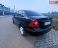 Черный Форд Фокус, объемом двигателя 1.56 л и пробегом 270 тыс. км за 4500 $, фото 4 на Automoto.ua