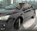 Черный Форд Фокус, объемом двигателя 1.6 л и пробегом 250 тыс. км за 5600 $, фото 1 на Automoto.ua