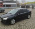 Черный Форд Фокус, объемом двигателя 1.8 л и пробегом 259 тыс. км за 4850 $, фото 1 на Automoto.ua