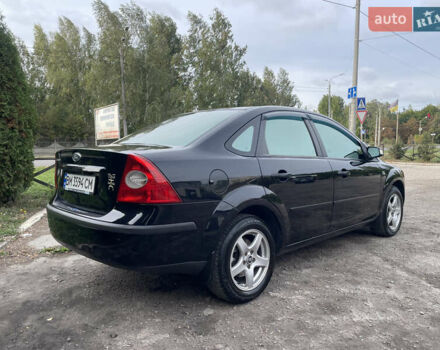 Форд Фокус 2006 в Сумах на Automoto.ua Черный Форд Фокус, объемом двигателя 2 л и пробегом 218 тыс. км за 5500 $, фото 17 на Automoto.ua