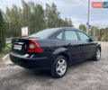 Форд Фокус 2006 в Сумах на Automoto.ua Черный Форд Фокус, объемом двигателя 2 л и пробегом 218 тыс. км за 5500 $, фото 17 на Automoto.ua